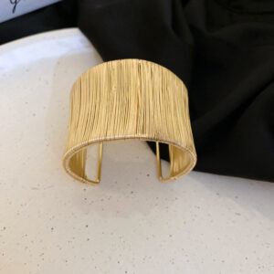 Gold wrapped Arm Bangles